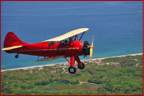 biplane over Cape Cod